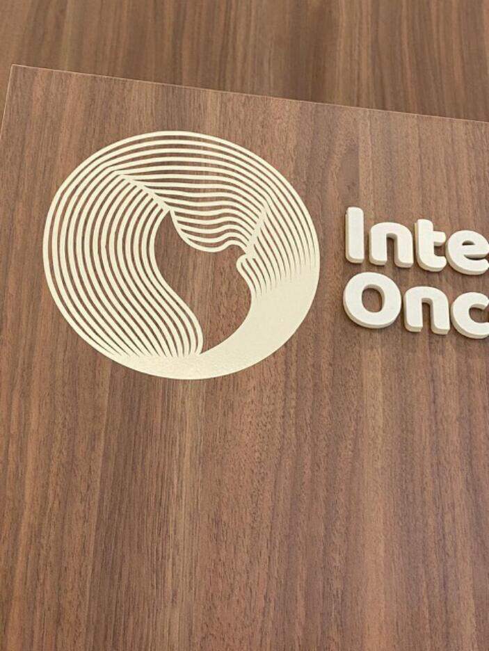 Wooden logo detail, International Oncology Center