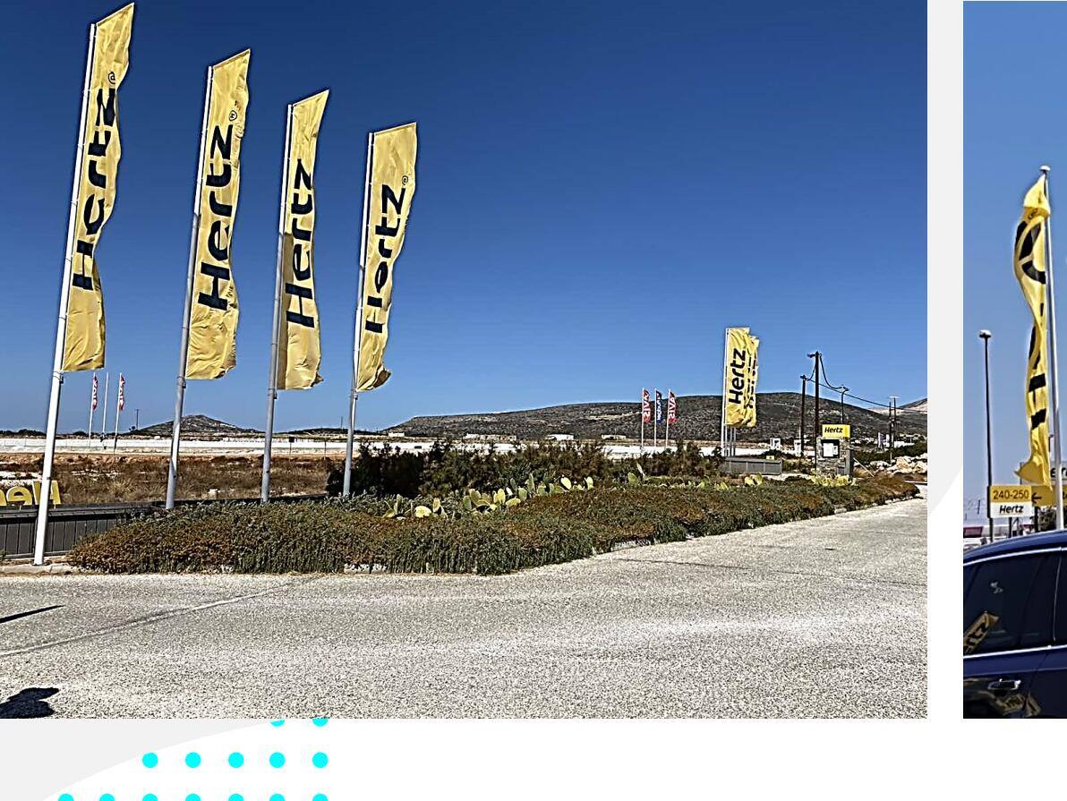 Flagpoles at the airport branch, Hertz