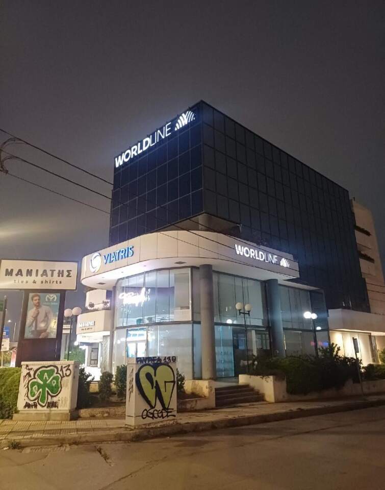 Building sign at night, Worldline