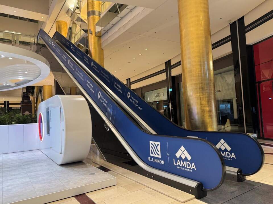 Escalator wrap, Lamda Development