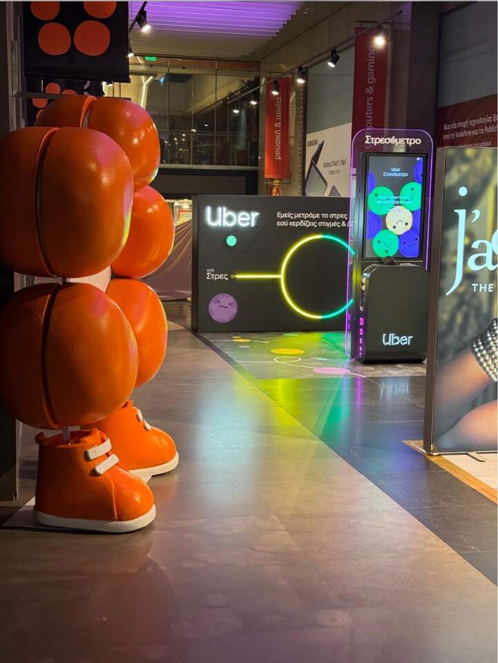 Kiosk with branded props, Uber